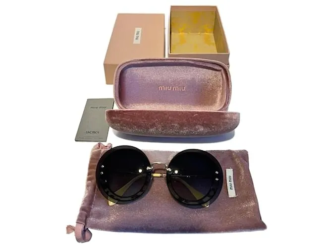 Gafas redondas Miu Miu Negro 